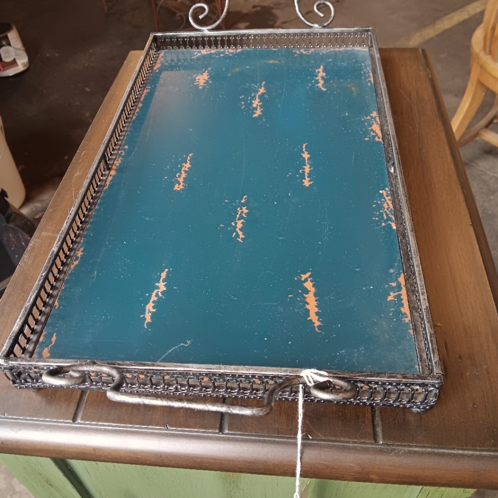 Metal tray with handles. Some discoloration.
